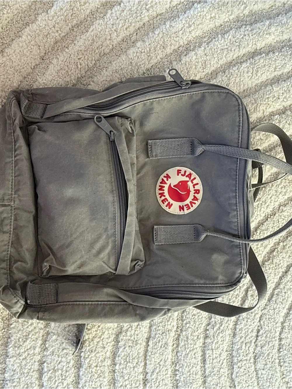 Fjallraven Kanken Classic Backpack in Gray with Red Logo
